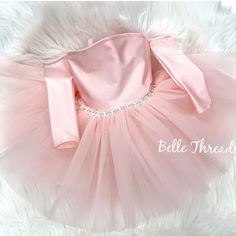 Your daughter will be the best dressed in our New Nova Off the Shoulder Tutu Dress. It's perfect for photo shoots, birthday parties and flower girl dresses. Details: Dress is not true to size and runs a tad big. If in between sizes, size down. Tutu is approximately knee Length. Dress has elastic so is meant to stay in place. You can email us to customize this dress in more colors or add length to this dress. Care: Hand wash in cold water preferred and hang to dry. ***Dress pictured on the model Photo Shoots Birthday, Girls Graduation Dresses, Red Tutu Dress, Garment District Nyc, Red Tutu, Luxury Girl, Cake Smash Outfit, Tutus For Girls, Best Dressed