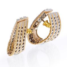 Important 18K Yellow Gold 6 Carat Diamond Twist Huggie Earrings. Post for pierced ears. Center Diamond Weight: 6.00Metal Type: 18K Yellow GoldMetal Weight: 29.2 gr.Condition: Excellent.Stock: RR7107 Luxury Clip-on Huggie Earrings For Formal Occasions, Luxury Hallmarked Diamond Earrings For Anniversary, Luxury Gold Plug Earrings For Formal Occasions, Formal Yellow Gold Wrap Earrings, Formal Luxury Gold Plug Earrings, Luxury Clip-on Earrings For Gift, Designer White Gold Diamond Earrings For Anniversary, Anniversary Gold Plated Earrings With Polished Finish, Gold Plated Earrings With Polished Finish For Anniversary