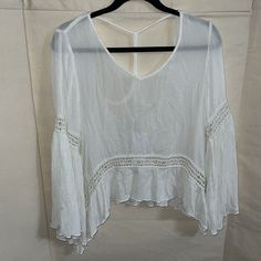 This Shirt Was Meant To Be Worn While Kicking Up Dirt At A Country Festival. Brand New With Tags, Size Medium. Boho Vibe With Bell Sleeves. Summer V-neck Tops With Crochet Lace, Casual Long Sleeve Crochet Lace Blouse, Long Sleeve Lace Top With Lace Trim For Summer, Bohemian V-neck Lace Top For Day Out, V-neck Tops With Crochet Trim For Vacation, Flowy Bell Sleeve Tops For Vacation, Casual Festival Tops With Crochet Trim, Summer Beach Blouse With Bell Sleeves, Summer Brunch Blouse With Lace Trim