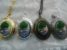 "Just added these adorable lockets to our collection - Petite lockets with PINK FLAMINGO cameos Center stone is 18x13mm the locket is right at one inch long one inch wide. It does come with a free 17\" chain but I can shorten it if you need me to **thank you for taking the time to look at our items. Each item is handcrafted and attention to detail - We send each item in bubble packaging and with tracking to make sure items arrive in perfect condition. Please feel free to check out our store as w Bubble Packaging, Pink Flamingo Party, Flamingo Necklace, Fox Wall Art, Gold Beach, Beach Pink, Flamingo Party, Party Necklace, Cameo Necklace