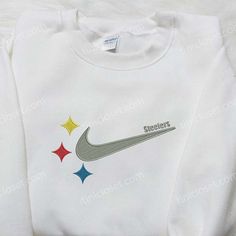 Introducing the Pittsburgh Steelers x Nike Embroidered Sweatshirt, a must-have for all NFL enthusiasts. This premium sweatshirt combines the iconic White Fleece Sweatshirt With Embroidered Logo, Game Day White Sweatshirt With Embroidered Graphics, White Team Spirit Sweatshirt With Embroidered Graphics, White Game Day Sweatshirt With Embroidered Graphics, White Sweatshirt With Embroidered Graphics For Team Spirit, White Fleece Top With Embroidered Graphics, White Embroidered Fleece Top, White Embroidered Logo Sweatshirt For Game Day, White Sweatshirt With Embroidered Sports Graphics