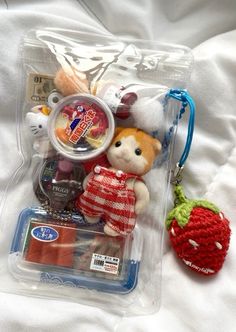 a stuffed animal and other items in a plastic bag