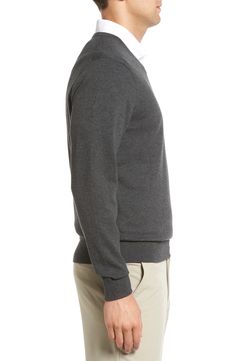 This essential layering piece is knit from a fine cotton-jersey blend with linked-seam detailing and ribbing. V-neck Long sleeves Ribbed neck, cuffs and hem 80% cotton, 17% nylon, 3% spandex Machine wash, dry flat Imported Gray Cotton Sweater With Ribbed Neckline, Casual Fitted Cotton V-neck Sweater, Gray Cotton Sweater For Layering, Gray Cotton Layering Sweater, Classic Fitted Cotton V-neck Sweater, Casual V-neck Sweater With Ribbed Cuffs For Layering, Layering Pieces, Vneck Sweater, Men Sweater