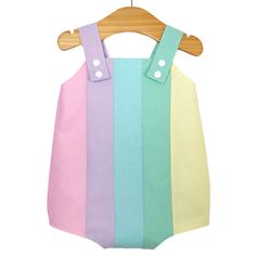 Pastel rainbow baby romper. Poppers for easy changing, relaxed fit, plenty of room for nappies (cloth or disposable). Fully lined with light soft cotton. Seamless insides making them comfortable against babies skin. Pastel rainbow design, repeated on the back. Carefully selected colours of luxury cotton. Adjustable length straps. Spring Multicolor Cotton Bodysuit, Multicolor Cotton Bodysuit For Spring, Multicolor Cotton Onesie For Summer, Summer Multicolor Cotton Onesie, Cute Multicolor Playtime Bodysuit, Multicolor Sleeveless Playwear Bodysuit, Multicolor Jumpsuits And Rompers For Spring Playtime, Cute Multicolor Cotton Bodysuit, Playful Multicolor Bodysuit For Playtime