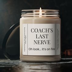 a candle with the words coach's last nerve on it