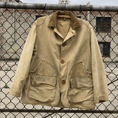 Vintage 1940s/1950s American Field Hettrick MFG. Co. Toledo, Ohio  This one is nicely faded out with pretty minor distressing for age and activity  Corduroy collar is ripped a bit  Distressing on color-looks dirty  Has been cleaned  Super soft one Inside in excellent condition  Measurements taken laying flat  Pit to pit 25  Length 26  Shoulders 19  Sleeve 22  Please contact me with any questions and I'll be happy to help 1950s Coat, Ribbed Knit Bodysuit, Hunting Jacket, Fur Coat Vintage, Toledo Ohio, Hunting Jackets, Chore Coat, Knit Bodysuit, Vintage Polo Ralph Lauren