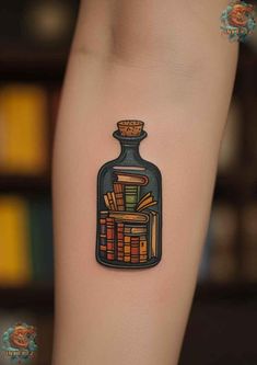 a bottle with books in it on the arm