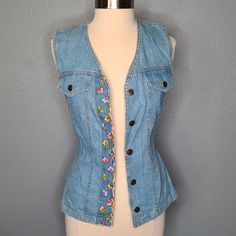 Nwt Vintage 90s Sleeveless Floral Embroidered Denim Button Down Blouse Shirt Brand: Switch Usa Size: S Floral Embroidered Design Hides Buttons Two Faux Front Pockets Made In The Usa 100% Cotton C-U-1 Denim Blue Vest With Button Closure For Spring, Fitted Sleeveless Denim Top With Buttons, Spring Denim Blue Buttoned Vest, Spring Blue Denim Vest With Buttons, Blue Denim Vest With Buttons For Spring, Button-up Medium Wash Vest For Spring, Medium Wash Button-up Vest For Spring, Blue Button-up Vest For Spring, Light Wash Fitted Vest For Spring