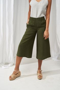 "One of the most stylish and versatile clothing pieces - wide and sweeping linen culottes. Tailored from Lithuanian softened linen fabric they make a great clothing piece for the office, effectively creates a stunning evening look as well. Design features an elastic waistband and side pockets that add a touch of elegance and comfort to even the simplest outfits. FABRIC: 100% softened Lithuanian linen COLOR: Please choose the desired color from the side menu. STYLE: Softened linen culotte pants w Green Pull-on Straight Pants, Versatile Wide Leg Trousers With Pull-on Style, Wide Leg Cotton Capris, Versatile Cropped Wide Leg Pants, Versatile Relaxed Fit Cropped Wide Leg Pants, Summer Wide Leg Relaxed Fit Capris, Wide Leg Relaxed Fit Summer Capris, Wide Leg Relaxed Fit Capris For Summer, Summer Wide Leg Culottes