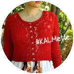 a woman wearing a red sweater and white skirt with the words kalamet on it