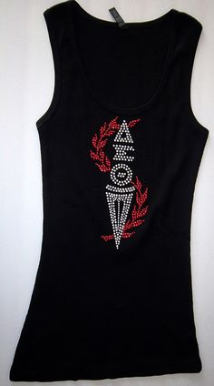 a black tank top with red and white sequins on the front, featuring an ice cream cone