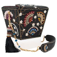 Mary Frances Hand-Beaded Novelty Handbag Inspired by the iconic Chinese food container, this unique accessory features intricate embellishments and elegant embroidered detailing making it a captivating blend of ancient traditions and modern fashion. Traditional Rectangular Shoulder Bag For Party, Embellished Rectangular Shoulder Bag For Festivals, Rectangular Embellished Shoulder Bag For Festivals, Bohemian Embellished Rectangular Evening Bag, Traditional Beaded Evening Bag, Traditional Beaded Evening Shoulder Bag, Luxury Beaded Square Bags, Designer Beaded Rectangular Bag, Traditional Handheld Embellished Evening Bag