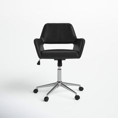 a black office chair sitting on top of a white floor