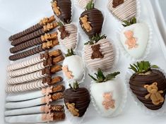 chocolate covered strawberries are arranged in the shape of heart shaped hearts and teddy bears