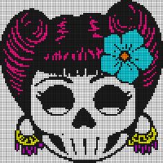 a cross stitch skull with a flower in it's hair and an image of a woman