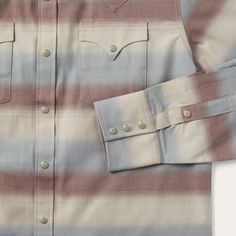 This Western-style shirt features our exclusive Ombre Stripe print and has a trim, modern fit. Authentic details include a one-point, ultra-deep back yoke, two front pockets, with one-point pocket flaps and three-snap cuffs. Subtly embossed Stetson logos on the chest pocket and sleeve placket along with striking interior paisley contrast trim add further style. Made from a sturdy 100% brushed twill cotton that hangs well while keeping its shape and only gets better with age. 100% Cotton One-Poin Western Style Fall Tops With Pockets, Western Style Tops With Pockets And Relaxed Fit, Western Style Tops With Pockets For Fall, Western Style Workwear Tops With Pockets, Fitted Cotton Shirt With Patch Pockets, Western Relaxed Fit Tops With Pockets, Western Style Cotton Shirt With Pockets, Fitted Cotton Tops With Patch Pockets, Fitted Tops With Patch Pockets For Fall