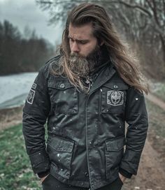 Grimfrost's 5 Year Anniversary Jacket! A unique jacket for the modern Viking that is inspired by the classic US Army M65 field jacket. Made in top quality peached twill, it can be worn over a hoodie or a t-shirt depending on the weather. We have given the jacket a vintage look with a Viking twist. A Grimfrost runic patch and a Raven Banner patch sits on the right upper arm. Our helmet design is printed across the left chest pocket. To top things off, we have given each wooden button a Younger Fu Younger Futhark, Modern Viking, Long Hair Beard, M65 Field Jacket, Instagram Advertising, 5 Year Anniversary, Viking Designs, Unique Jackets, Helmet Design