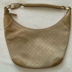 Gucci (100% Authentic)- Vintage Embossed Suede Hobo Color: Beige/Ivory/ Brown Condition: Excellent Condition - (Smoke-Free Home) Details: This Vintage Hobo Bag Features A Leather And Suede Leather Body With Leather Trim, A Flat Leather Handle, A Top Zip Closure And Interior Zip Pocket. This Bag Was Only Used One Time. Key Features: Gucci Hobo Vintage Neutrals Suede Gold-Tone Hardware Leather Trim Single Shoulder Strap Twill Lining & Single Interior Pocket Zip Closure At Top Approximate Dimensions: Shoulder Strap Drop: 7" Height: 8.75" Width: 15.5" Depth: 1.25" Item # Guc922726 This Bag Does Have Some Minor Marking - See Photos For Detai Gucci Formal Hobo Bag With Gold-tone Hardware, Gucci Leather Hobo Bag With Gold-tone Hardware, Gucci Brown Bag With Silver-tone Hardware, Gucci Leather Bags With Gold-tone Hardware, Gucci Shoulder Bag With Gold-tone Hardware For Shopping, Leather Trim, Hobo Bag, Leather Trims, Leather Handle