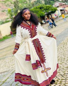 Add this flawless stunning traditional dress wear to your wardrobe for extra grace and beauty. It perfectly incorporates the cultural richness of Habesha dress with modern sophistication, making it ideal for any occasion. Material Cotton Thread Estimated delivery : 1 week to 2 weeks Contact WhatsApp +1(304)-306-2784Email: contact@ethiopian.store Habesha Wedding Dress Ethiopia, Holiday Wedding Dress, Traditional Festive Habesha Kemis With Woven Motifs, Traditional Festive Habesha Kemis Handloom, Traditional Embroidered Habesha Kemis For Festival, Ethiopian Dress Modern 2022, Habesha Dress Eritrean 2022, Festive Folk-style Habesha Kemis, Habesha Kemis