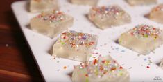 some small pieces of cake with sprinkles on them