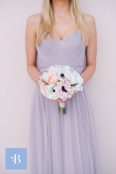 The Charlotte bridesmaid bouquet is made of pink and white anemones, pink and white roses, hints of lavender, and greenery. Premium silk florals. Pink And White Bridesmaid Bouquet, White Bridesmaid Bouquet, Lilac Bridesmaid Dress, White Anemones, Lilac Bridesmaid, Anemone Bouquet, Pink And White Roses