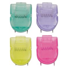 four different colored plastic toothbrush holders on a white background