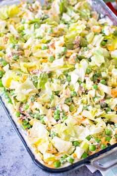 a casserole dish with peas and other vegetables