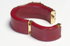 Limited Edition Prada Bracelet.Prada red leather and crystal bracelet from Spring 2014 Collection in very good condition. Collectors item! Approximate Measurements: Circumference 6”, Width 1” (best suitable for a small wrist). Made in Italy. Elegant Red Leather Bracelets, Luxury Red Leather Jewelry, Elegant Red Leather Bracelet, Luxury Red Leather Bracelets, Luxury Red Leather Bracelet, Formal Leather Bangle Jewelry, Elegant Formal Leather Cuff Bracelet, Formal Leather Cuff Bracelets, Elegant Leather Cuff Bracelet For Party