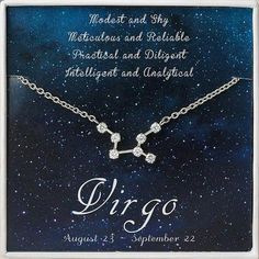 the zodiac sign virgo necklace is displayed in front of a starr sky with stars