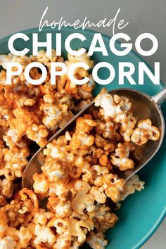 homemade chicago popcorn on a blue plate with a spoon