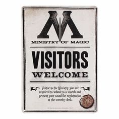 a sign that says visitors welcome to the visitor's area and is on display