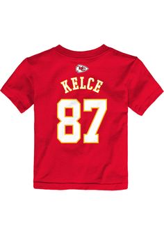 Travis Kelce Kansas City Chiefs Infant Mainliner NN Short Sleeve T-Shirt Red Game Day Jersey T-shirt With Letter Print, Jersey T-shirt With Letter Print For Game Day, University Red T-shirt With Team Name For Fans, Sporty Red T-shirt With Letter Print, Game Day Jersey T-shirt With Logo Print, University Red Short Sleeve T-shirt For Game Day, Collegiate T-shirt With Name Print For Fans, Red Team Spirit Tops With Logo Print, Jersey Sports Fan Top For Game Day