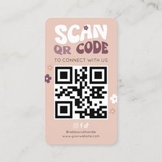 a qr code on a marble surface with flowers in the background and text that reads scan or code to connect with us