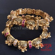 Sabiha Bridal Kundan Bracelet Set/Rajwadi Kundan Jadau Kada with Ruby/Kundan stones Features: Made in Brass with 22 Karat Gold polish Pair of 2 Bangles Thickness: Approx .85 Inches Openable Bangles/Kadas Made with very high quality Kundan Stones with Ruby Pink semi-precious stones. Authentic Pakistani/Punjabi Bangles/Kada set Screw Closure Rajasthani Kada, Rajasthani Bangles, Rajasthan Jewellery, Rajwadi Bangles, Indian Wedding Rings, Dreamscape Architecture, Ruby Bangles, Bridal Jewellery Inspiration, Anklet Designs