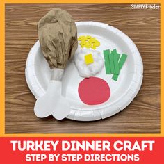 a paper plate with some food on it and the words turkey dinner craft written below