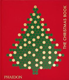 the christmas book is red and green with white dots on it, as well as gold circles