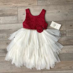 Beautiful Dress With A Red, Lace Top And Tiered Cream, Straight Tulle On The Skirt. There Is A Jeweled Band On The Waist Of The Front And Cream Straps That Tie In The Back. There Is A Hidden Zipper On The Back Of The Dress. The Dress Is 100% Polyester And Is Machine Washable. Cute Red Sleeveless Princess Dress, Cute Red Sleeveless Tutu Dress, Cute Red Tutu Dress With Ruffles, Cream Formal Dresses, Pink Toddler Dress, Zara Girls Dresses, Red Lace Top, Satin Flower Girl Dress, Girls Lace Dress