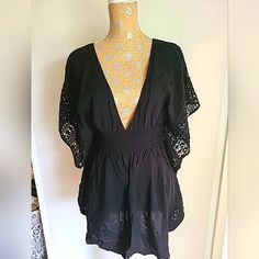 This Victoria's Secret Beach Swim Coverup In Size M Is Perfect For Your Next Beach Day. The Black Color And Crochet Butterfly Sleeves Add A Touch Of Style To This Lightweight, Backless Coverup. Made Of 100% Viscose, This Coverup Is Easy To Care For With Hand Wash Only. The Beach Theme Makes It A Must-Have For Any Summer Wardrobe. Pet & Smoke Free Home Fitted Lace Dresses By Victoria's Secret, Victoria's Secret Summer Dress For Date Night, Victoria's Secret Summer Date Night Dresses, Victoria's Secret Mini Dress For Summer Date Night, Elegant Victoria's Secret Mini Dress For Summer, Elegant Beach Mini Dress With Crochet Trim, Victoria's Secret Beach Dress, Black Lace Mini Dress For Beach, Black Mini Dress For Beach Cover-up