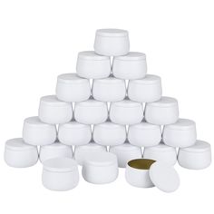 a pyramid made out of white plastic cups