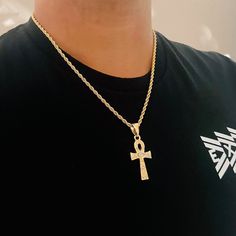 "The men's gold filled Ankh Cross Chain Necklace is a stylish accessory that combines ancient symbolism with modern fashion. Crafted with precision, this chain features a prominent Ankh cross pendant, representing life and eternity, making it a captivating statement piece for any discerning individual. ⭐️Item Details:  Chain Width: 2.5mm Pendant Size: 31.5 x 18mm  Material: Gold Filled Benefits: Water & Tarnish Resistant, Hypoallergenic  ⭐️About Our Necklaces:  Our necklace collection is made to Gold Ankh Chain Necklace, Symbolic Cross Pendant Necklaces, Sicilian Jewelry, Cross Chain Necklace, Egyptian Cross, Key Of Life, Ankh Necklace, Ankh Cross, Necklace Collection