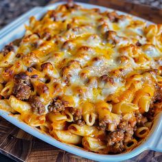 a casserole dish filled with meat and cheese