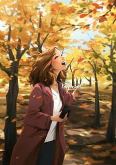 a woman standing in front of trees with fall leaves