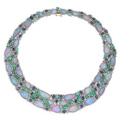 70.0 Carat Opal Emerald Diamond Statement Necklace | From a unique collection of vintage Choker Necklaces at https://www.1stdibs.com/jewelry/necklaces/choker-necklaces/. Formal Opal Necklace With 17 Jewels, Elegant Blue Emerald Necklaces, Opal Jewelry With Gemstone Accents For Formal Occasions, Elegant Opal Jewelry With Gemstone Accents, Formal Opal Jewelry With Gemstone Accents, Formal Opal Gemstone Jewelry, Elegant Opal Jewelry With Cabochon, Unique Opal Necklaces For Formal Occasions, Formal Multi-stone Costume Jewelry