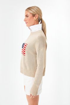 A closet essential, the Cropped Americana Sweater evokes a nostalgic feeling while featuring modern design details for an updated take on the classic staple piece. This season-less, 100% cotton pullover will take you from backyard bonfires to apple picking with its boxy fit and intarsia flag front and center. Cropped, boxy fit American flag detail Drop-seam shoulder detail Material: 100% Cotton Care: Hand wash separately in cold water with mild detergent. Reshape and lay flat to dry. Cool iron i Backyard Bonfire, Plus And Minus, Closet Essentials, Apple Picking, Cotton Pullover, Sweater Sale, Staple Pieces, Long Sleeve Sweater, American Flag