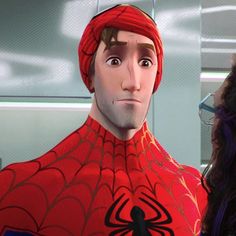 a man in a red spider suit is standing next to a woman