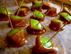 caramel and green candy on sticks with toothpicks