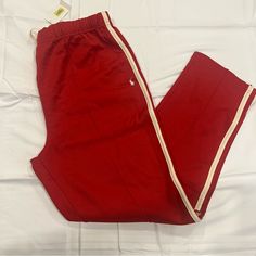 Polo Sport Ralph Lauren Sweat Pant Jogger Striped With Ankle Zip Barn Red. Horse Logo Cream Side Stripe. Center Seam. No Pockets. Elastic Waist, Drawstring. Soft Vintage Casual Red Joggers For Fall, Red Athleisure Bottoms For Fall, Red Sweatpants With Elastic Waistband For Fall, Red Straight Sweatpants Casual Style, Red Sweatpants With Elastic Waistband For Spring, Sporty Red Pants With Elastic Waistband, Red Elastic Waistband Sweatpants For Fall, Casual Red Tapered Leg Pants, Sporty Red Straight Leg Bottoms