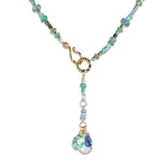 Gold & Stone Necklace - An 18k vermeil clasp and 18k gold vermeil beads highlight a mixed array of emerald, tanzanite, turquoise, and apatite in this multi-colored stone necklace. Below, fluorite, green amethyst, and iolite briolettes dangle from an 18k vermeil hammered hoop. 1618 adjustable chain; hook clasp closure. Wire Wrapped Beaded Necklace, Blue Multi-stone Round Beads Jewelry, Dainty Gemstone Beaded Necklace, Beautiful Necklaces Unique, Gemstone Necklace Diy, Beaded Lariat Necklace, Gem Stone Necklace, Gold Stone Necklace, Iolite Jewelry