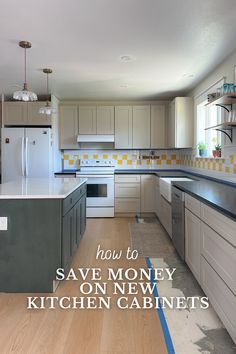 a kitchen with white cabinets and blue tape on the floor that says how to save money on new cabinets