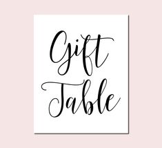 a black and white print with the words gift table in cursive font on it